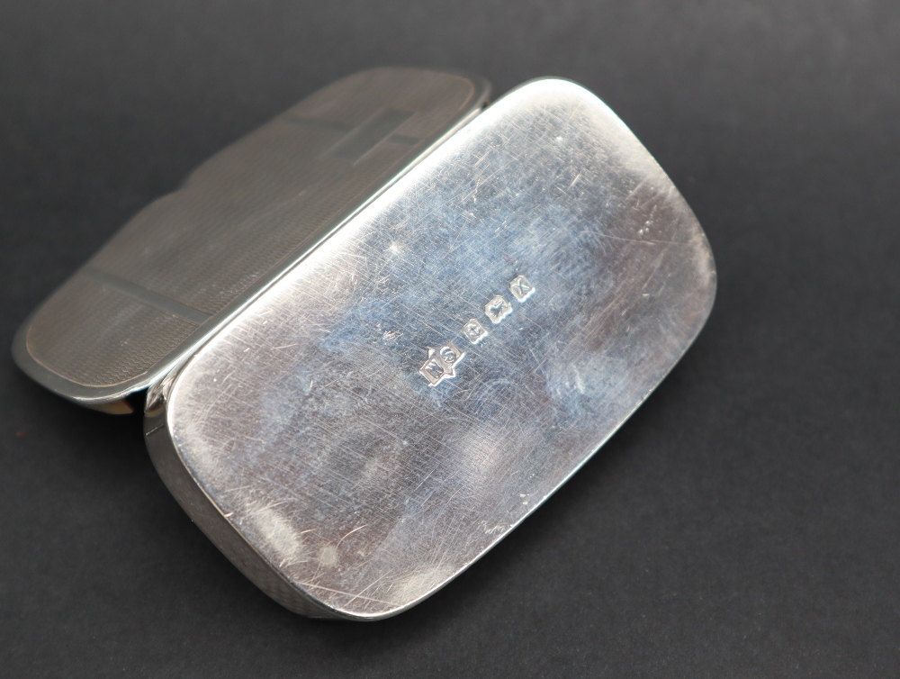 A George VI silver pill box of shaped rectangular form, with engine turned decoration, Birmingham, - Image 3 of 4