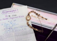 A lady's 9ct gold Smiths International wristwatch,