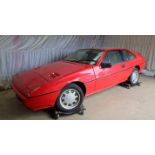 A Lotus Excel, registration number KIW 2704, 2174cc, first registered August 1985, in red,