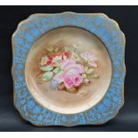 A Royal Doulton cabinet plate painted with a spray of garden flowers,