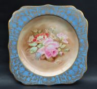 A Royal Doulton cabinet plate painted with a spray of garden flowers,