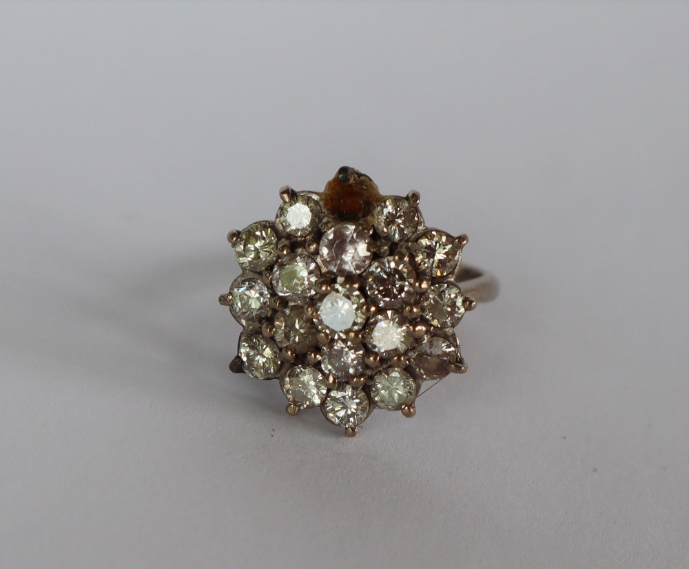 A diamond cluster ring,