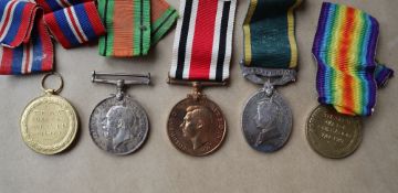 A George VI Territorial medal, issued to LT. T.F. Hinde R.A.S.