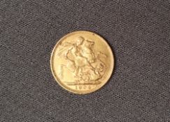 An Edward VII gold sovereign dated 1904,