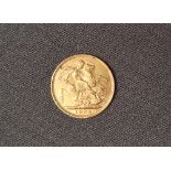 An Edward VII gold sovereign dated 1904,