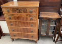 A 20th century walnut chest of drawers,