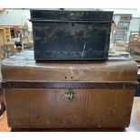 A tin trunk together with a black painted tin box