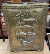 A brass umbrella stand,