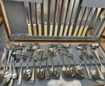 A chrome plated cased part flatware service