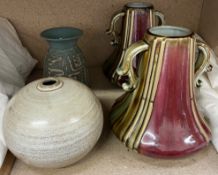 A Claypits Ewenny studio pottery vase together with a pair of twin handled pottery vases and