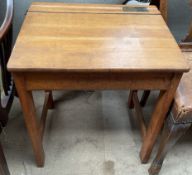 A child's school desk,