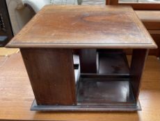 A mahogany revolving table top bookcase