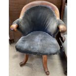 A mahogany framed and upholstered captains chair