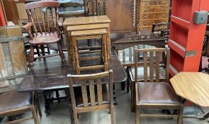 An Edwardian mahogany gateleg table together with three oak chairs, a nest of three oak tables,