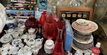 Assorted miniature tea sets together with ruby glass vases, various plates,