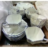 A Shelley part tea service including six cups, six saucers, cream jug, sugar basin,