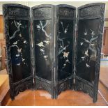 A Japanese lacquered and inlaid four fold screen, decorated with birds,