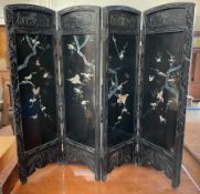 A Japanese lacquered and inlaid four fold screen, decorated with birds,