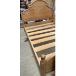 A pine double bed,