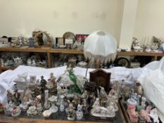 A large lot including pottery figures, horse table lamp, vases,