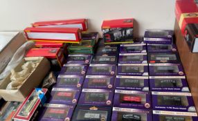 A collection of Hornby and Dapol model train carriages etc