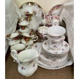 A Royal Albert Old Country Roses pattern part tea set together with a Royal Albert Serena pattern
