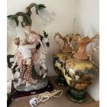 A large resin lamp from the Julian collection depicting a lady and gentleman on a horse,