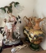 A large resin lamp from the Julian collection depicting a lady and gentleman on a horse,