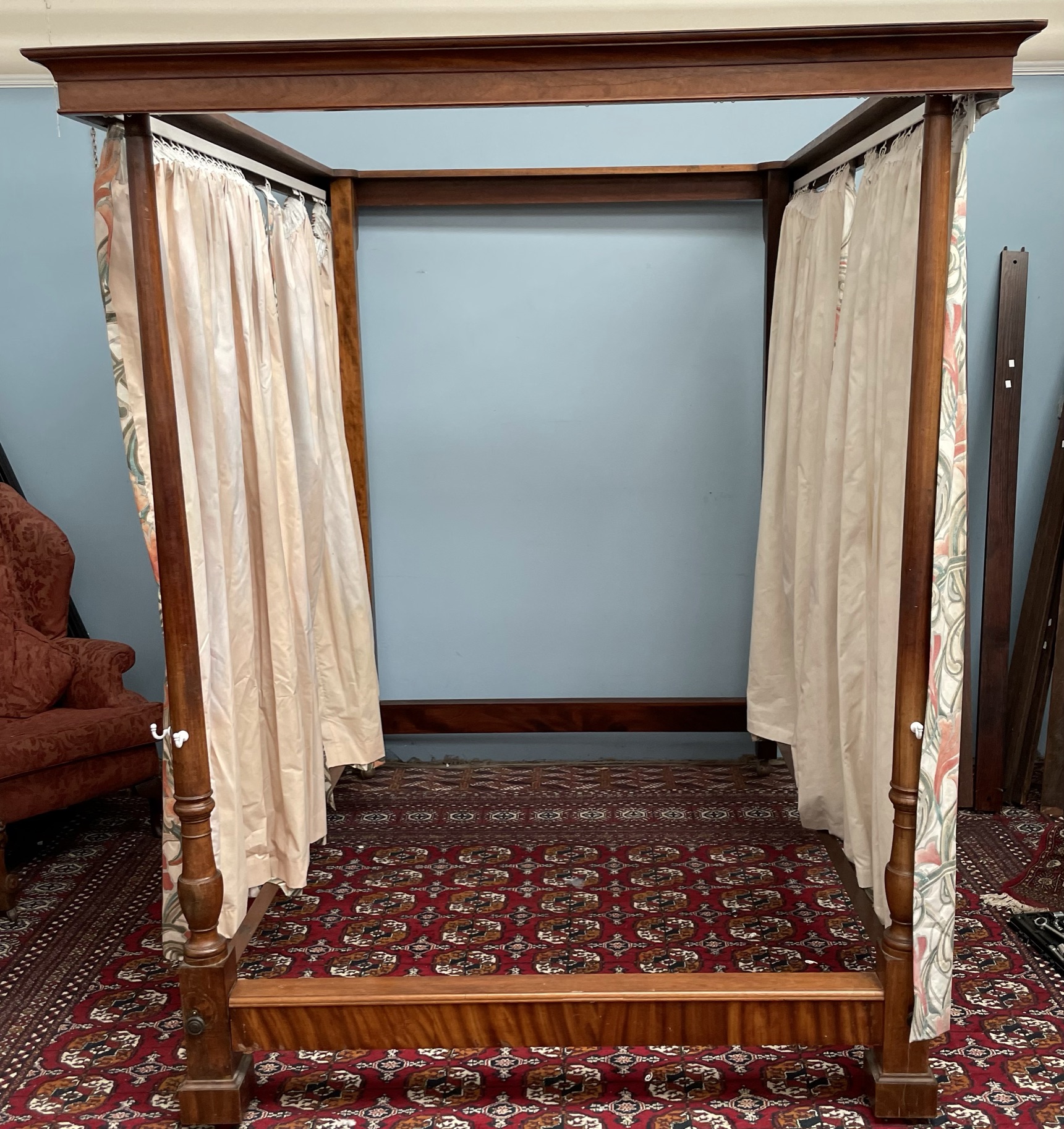 A mahogany four poster bed,