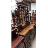 An Edwardian mirrorback sideboard, with three mirrors,