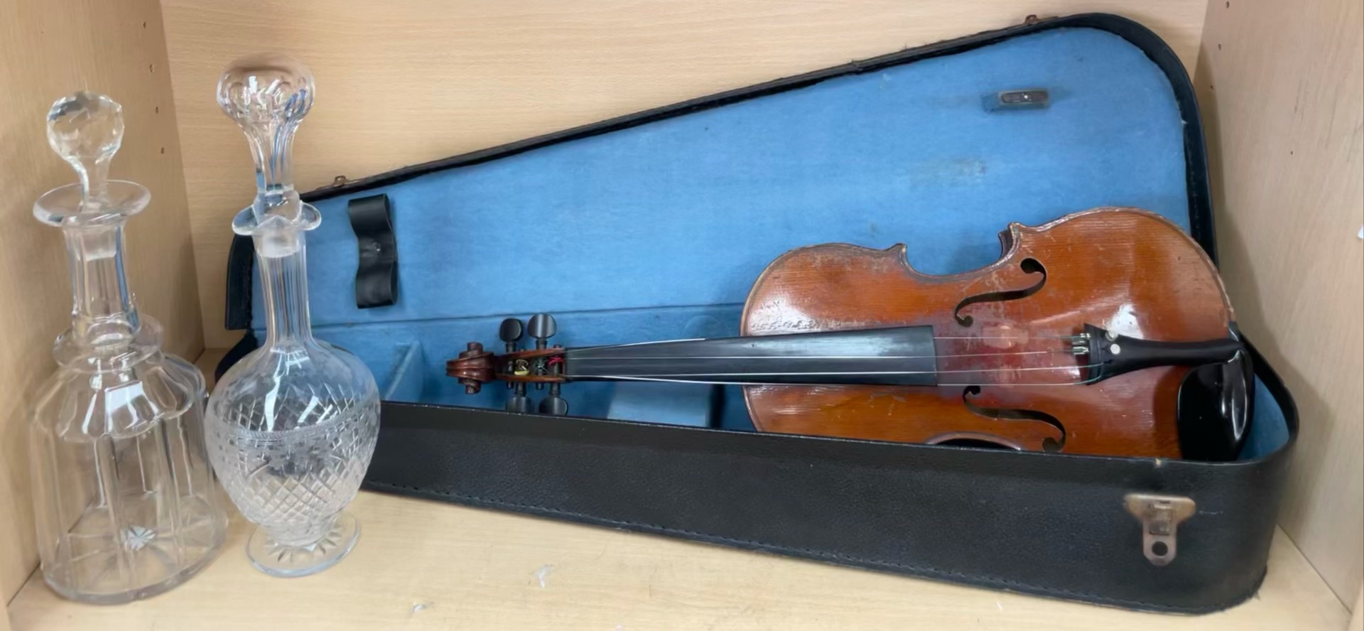 A Fortis and Dulcis violin, with a one piece back and ebonised stringing,