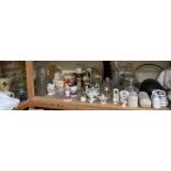 An extensive lot, including a military helmet, crested wares, glasswares, decanters, steins,