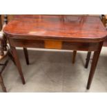 A 19th century mahogany tea table,