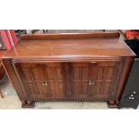 A 20th century oak sideboard,