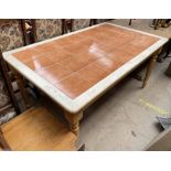 A tiled top kitchen table