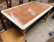 A tiled top kitchen table