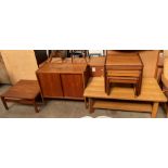 A teak nest of three tables together with a teak side cabinet designed by B Fridhagen for Bodafors,