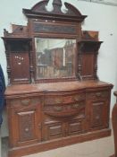 An Edwardian mirrorback sideboard, with a central rectangular mirror,