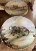 A set of twelve Minton Bone China plates, decorated with scenes including Conway Castle,