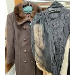 A fur stole together with another,