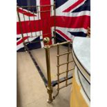A Victorian four foot brass bed