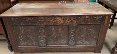 An 18th century oak coffer,