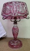 A flash glass table lamp with glass shade and glass baluster column ad spreading foot