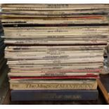 A collection of records including The Beatles, Tom Jones, Gerry and the Pacemakers,