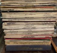 A collection of records including The Beatles, Tom Jones, Gerry and the Pacemakers,