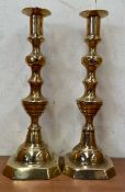 A pair of brass candlesticks