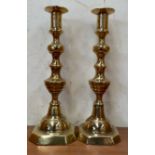 A pair of brass candlesticks