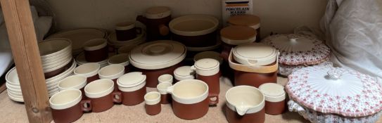 A Hornsea terracotta and cream cinnamon pattern part tea and dinner service together with a pair of