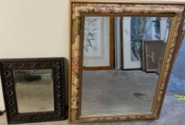 An oak framed wall mirror together with a painted wall mirror