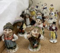 A set of six Mansion House dwarves together with continental porcelain figures etc